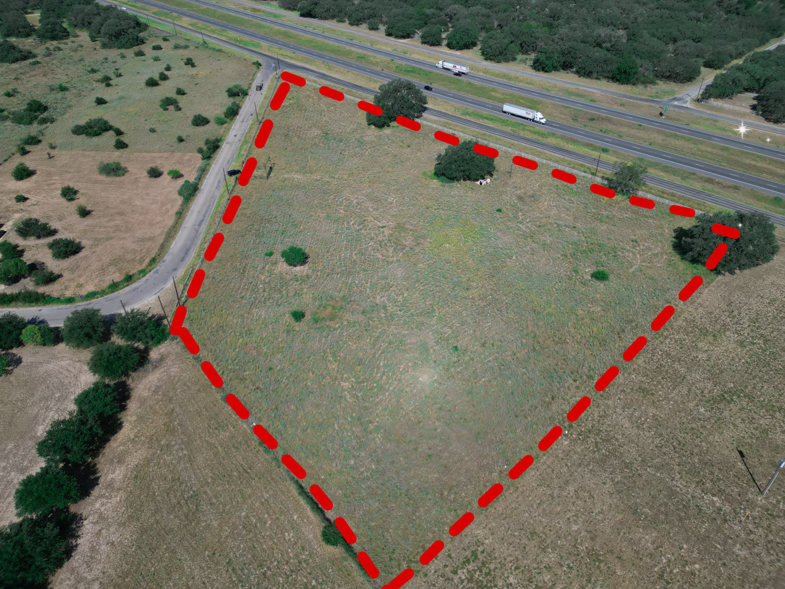 Land parcel aerial with boundary overlay